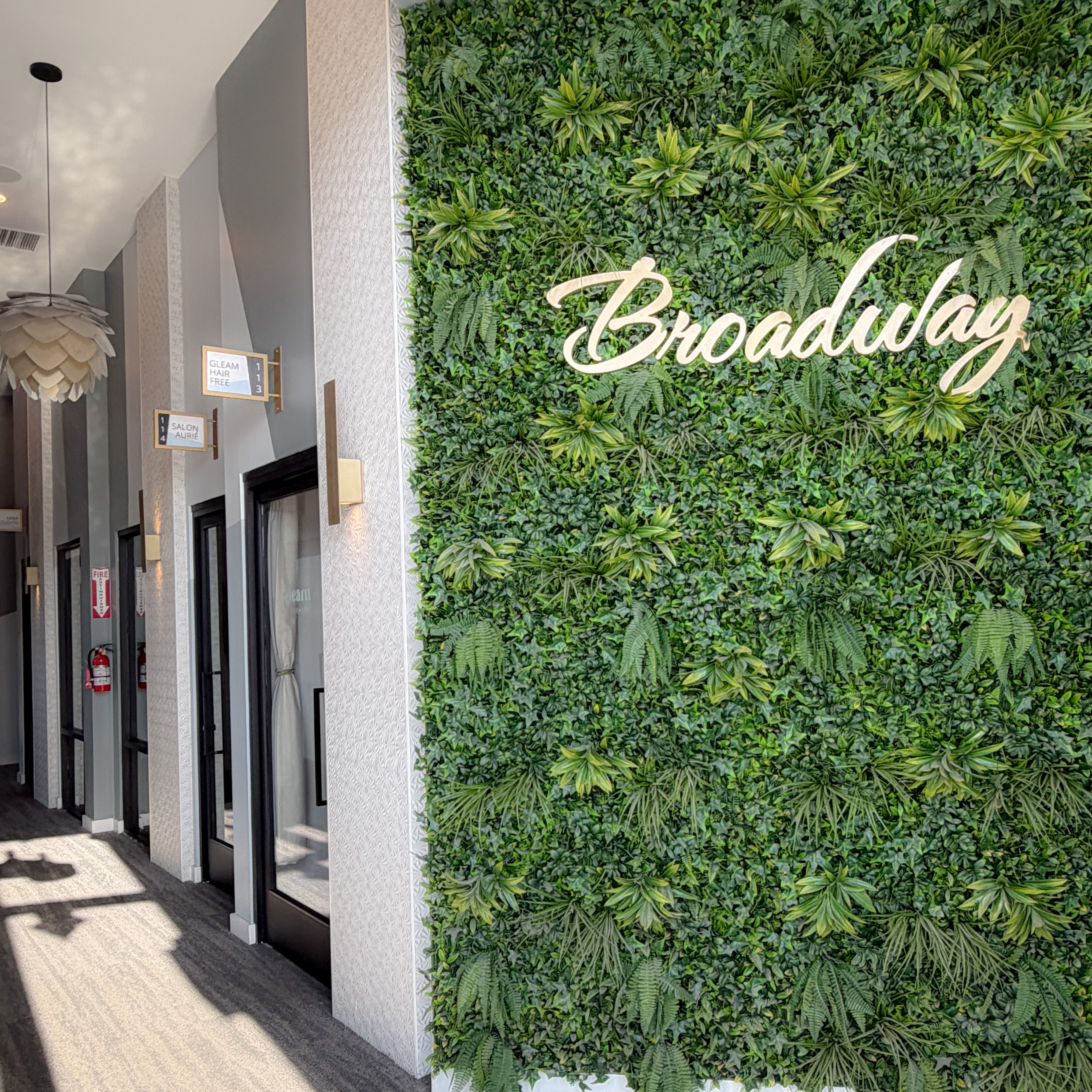 Broadway at Kettner building hallway with green living wall