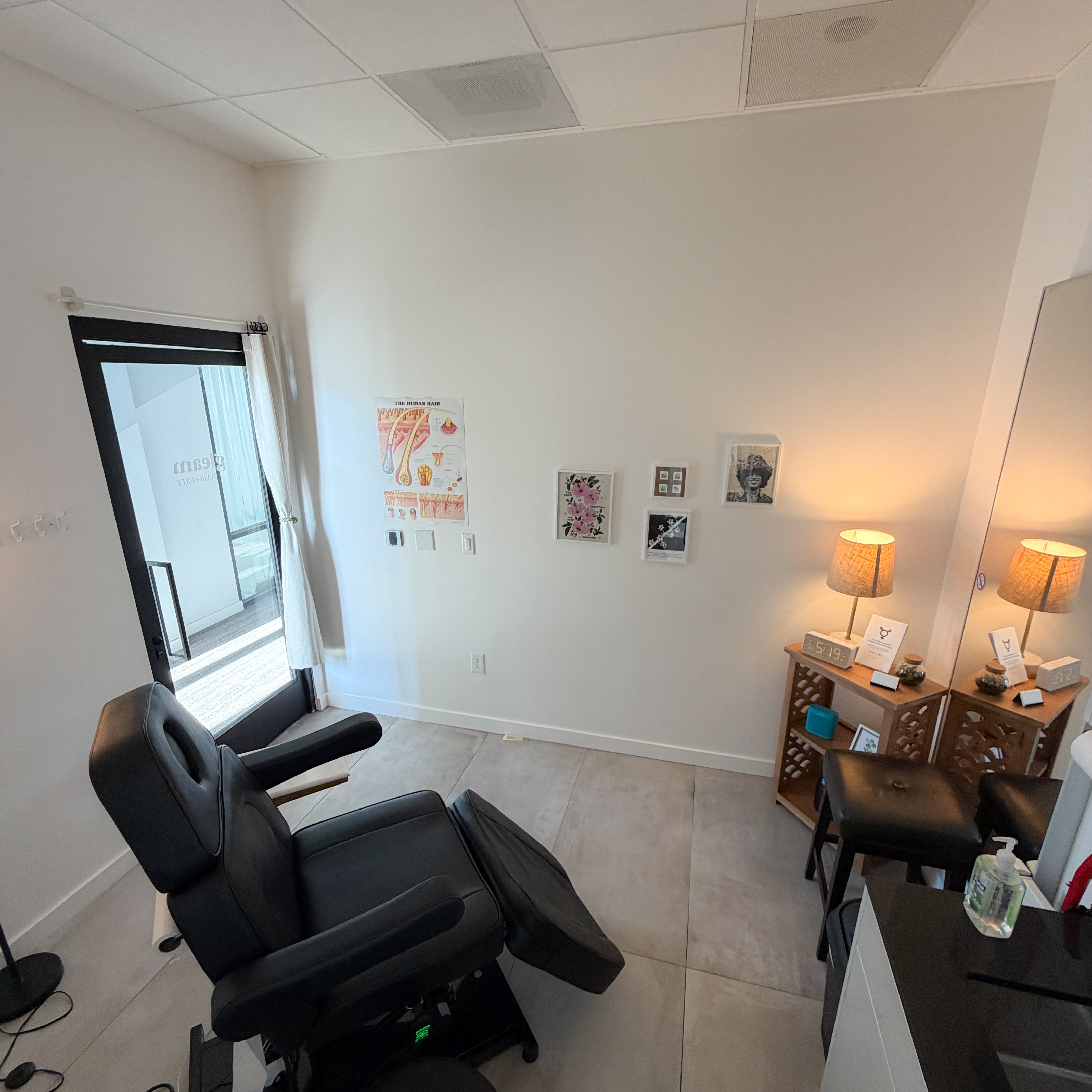 Treatment room with chair and cozy decor